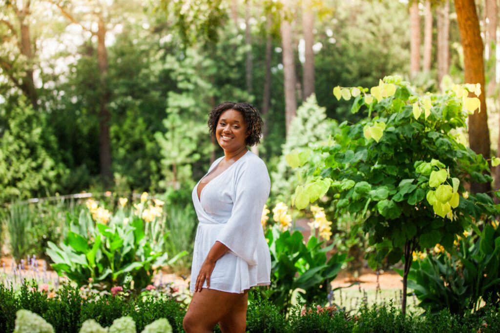 a woman in the flower garden at WRAL Azalea Gardens