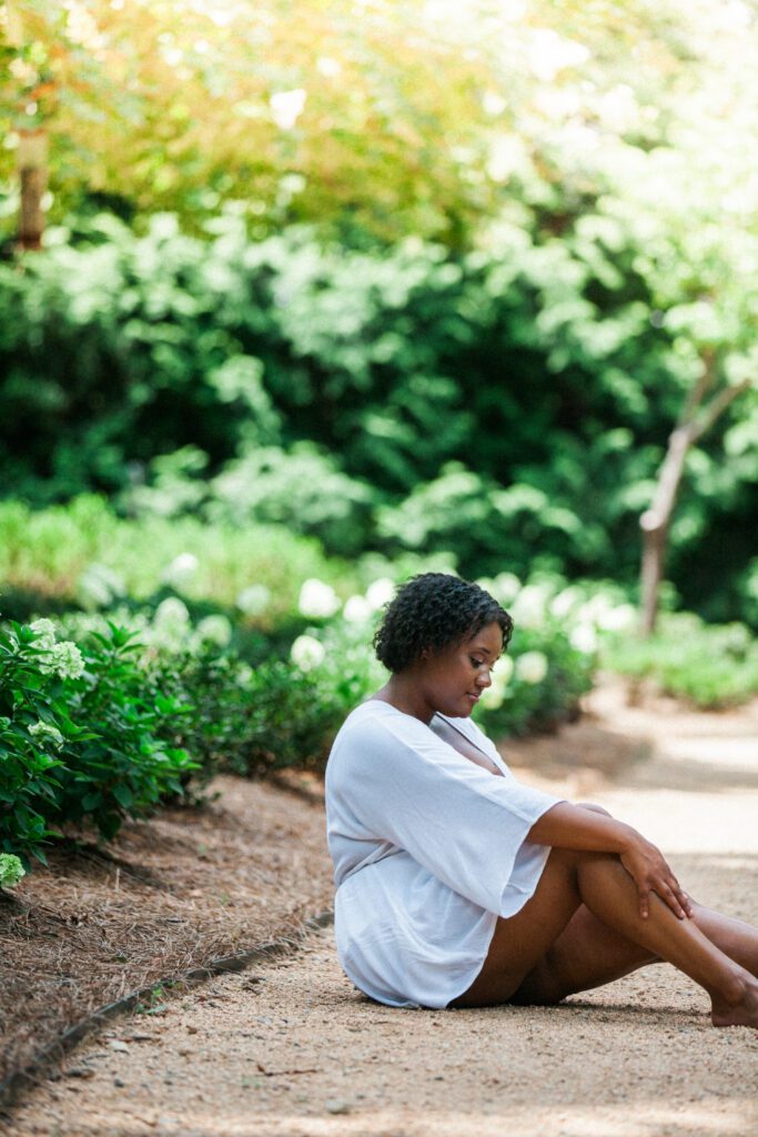 a woman in the flower garden at WRAL Azalea Gardens