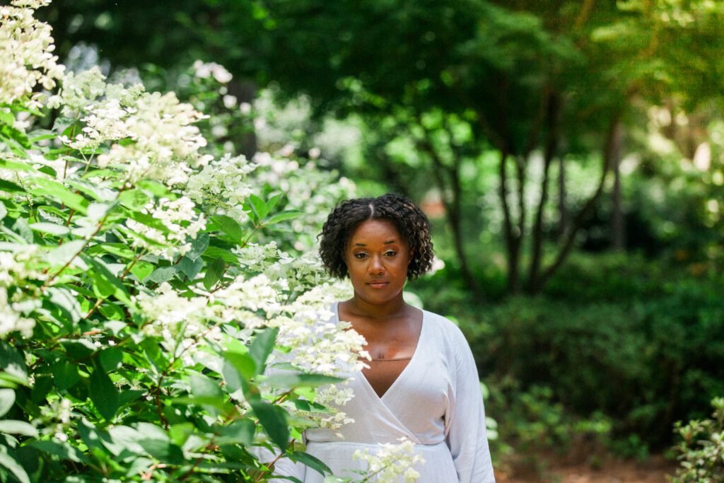 a woman in the flower garden at WRAL Azalea Gardens