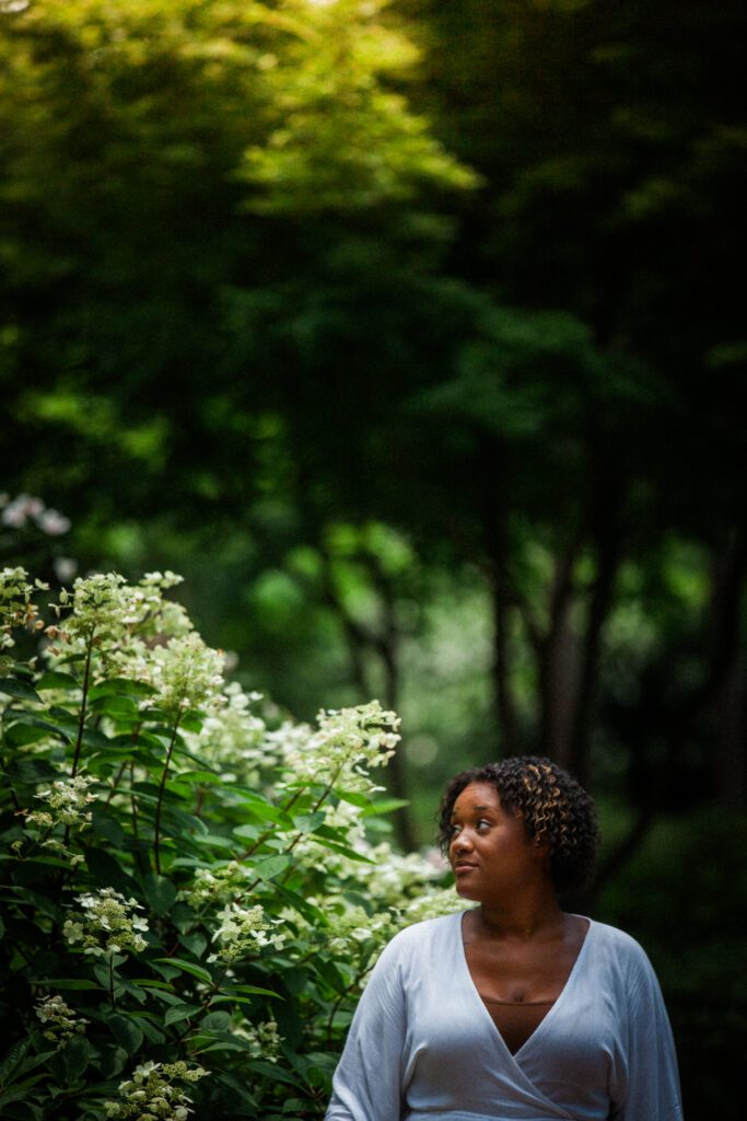 a woman in the flower garden at WRAL Azalea Gardens