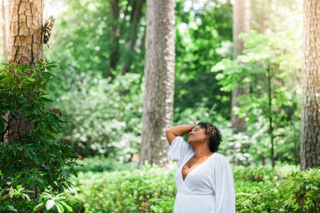 a woman in the flower garden at WRAL Azalea Gardens